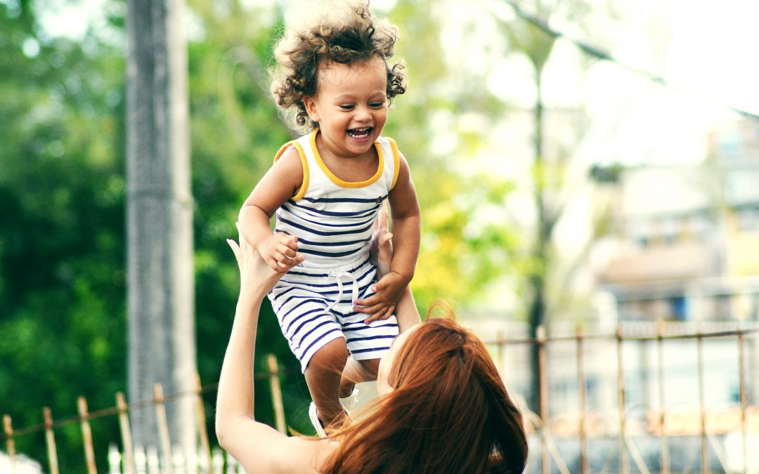 mom throwing toddler in the air | Long Island NY Toddler Sleep Consultant | Sleep Rest and Play