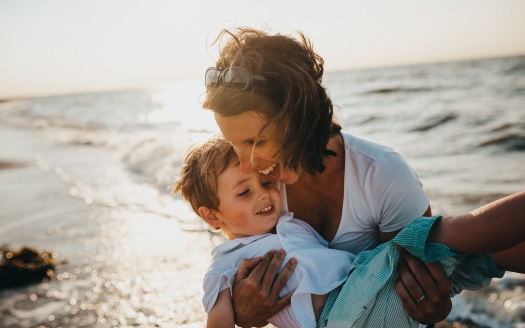 mother and son at the ocean | Long Island NY Sleep Consultant | Sleep Rest and Play